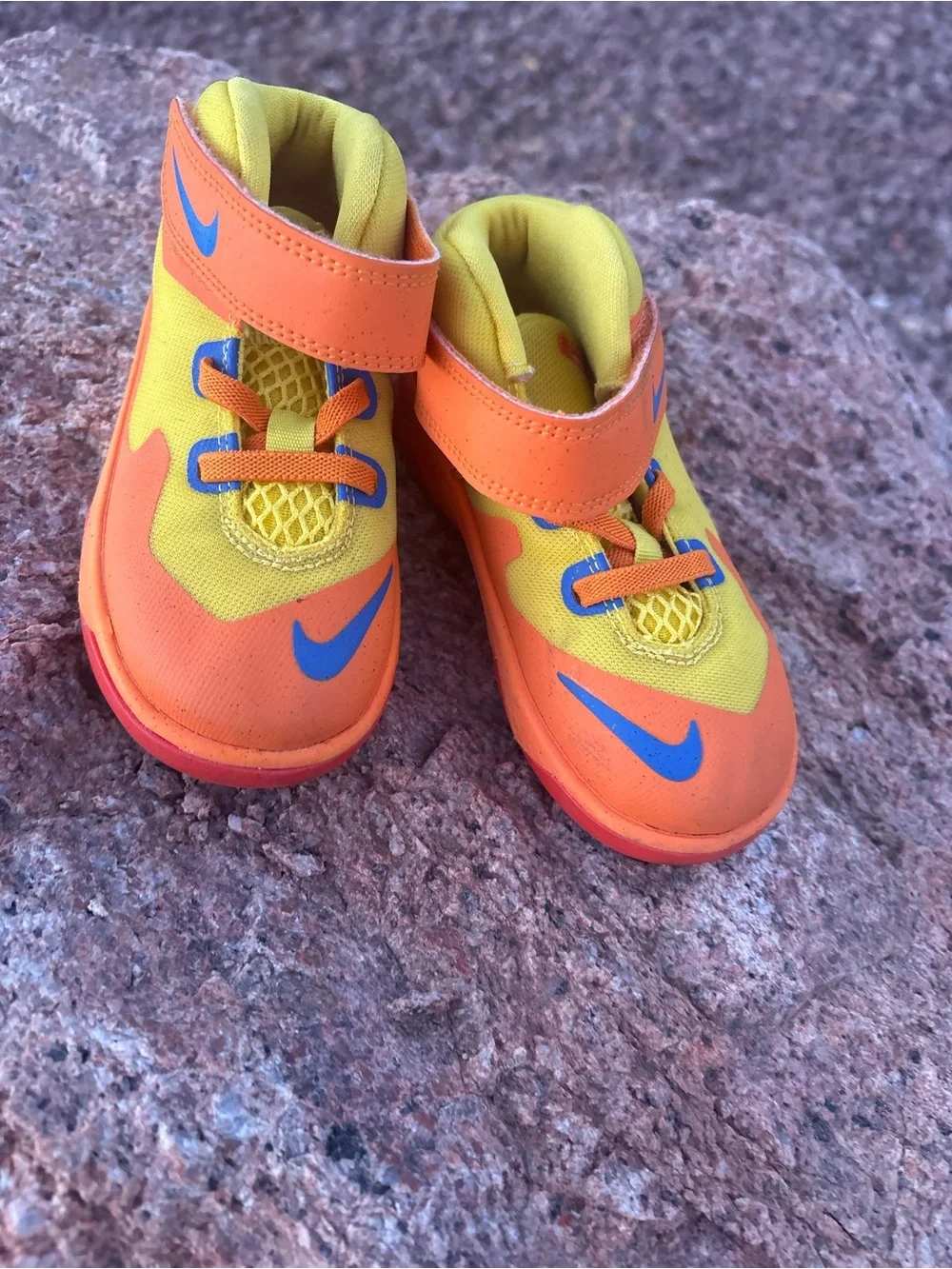 Nike Kids Orange and Yellow Hook-and-Loop Sneakers with Blue Swoosh